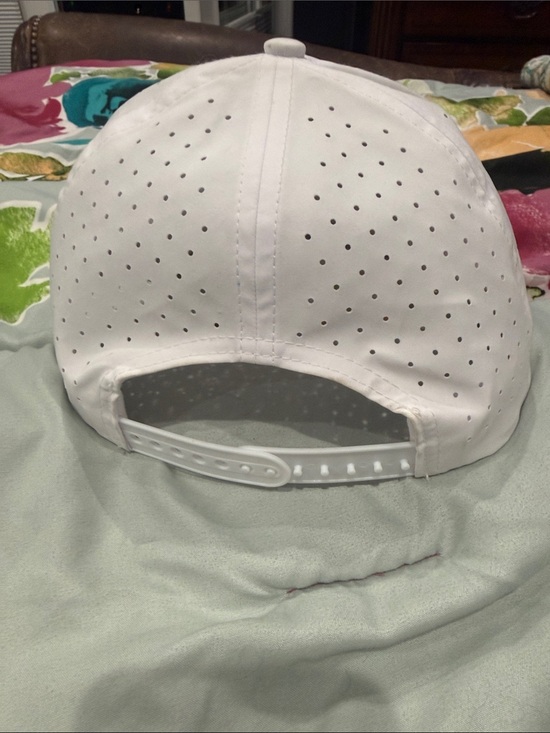 Bright white Driving Range Pro White Trucker Hat with Red & Blue Patch
